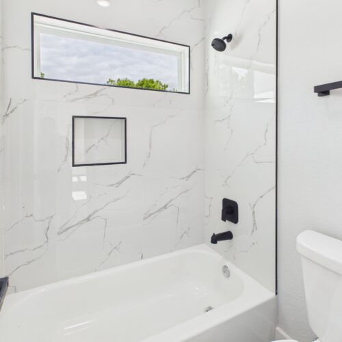 Modern bathroom with tub and shower combination